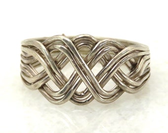 Vintage sterling silver 8-piece puzzle ring