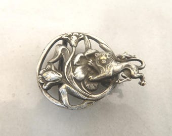 Hebilla de cinturón vintage con diseño floral de león en tono plateado