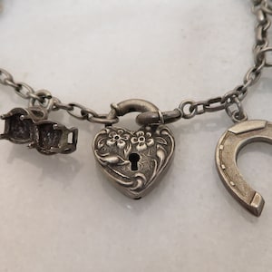 Vintage Sterling Silver Heart lock and many charms