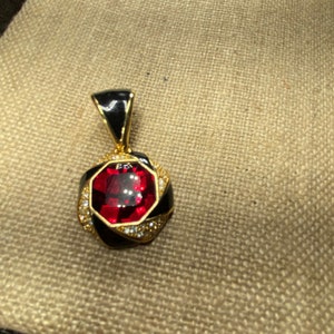 Vintage Swarovski Gold Tone Black Enamel Red and Clear Crystal Pendant