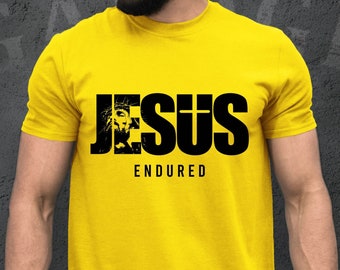 May include: Yellow t-shirt with a black graphic that says "JESUS ENDURED". The graphic features a black and white image of Jesus.