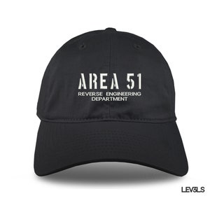May include: Black baseball cap with white embroidered text that reads "AREA 51 REVERSE ENGINEERING DEPARTMENT".