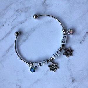 Winter inspirational phrase silver cuff bracelet with premium crystals and snowflake charms