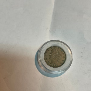 V” nickel 1883 in VF condition