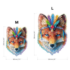 May include: Two sizes of a colourful fox head jigsaw puzzle. The fox is wearing a beaded headband with feathers and a butterfly. The puzzle is available in sizes 10 inches by 10 inches and 14 inches by 14 inches.