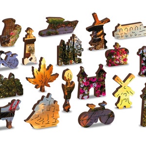 May include: A set of 15 wooden jigsaw puzzle pieces featuring various images of a city, including a lighthouse, a windmill, a bicycle, a boat, and a maple leaf. The pieces are all different shapes and sizes and are made of a dark brown wood.