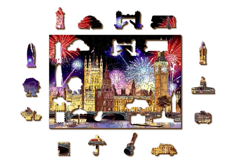 May include: A jigsaw puzzle depicting a nighttime view of London, England with fireworks exploding over the Houses of Parliament and Big Ben. The puzzle is made of wood and has a variety of colors, including red, white, blue, and gold.