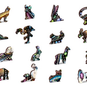 May include: A set of 15 wooden animal figurines, each intricately decorated with colorful beads and jewels. The animals include a wolf, cat, rabbit, giraffe, elephant, and more.