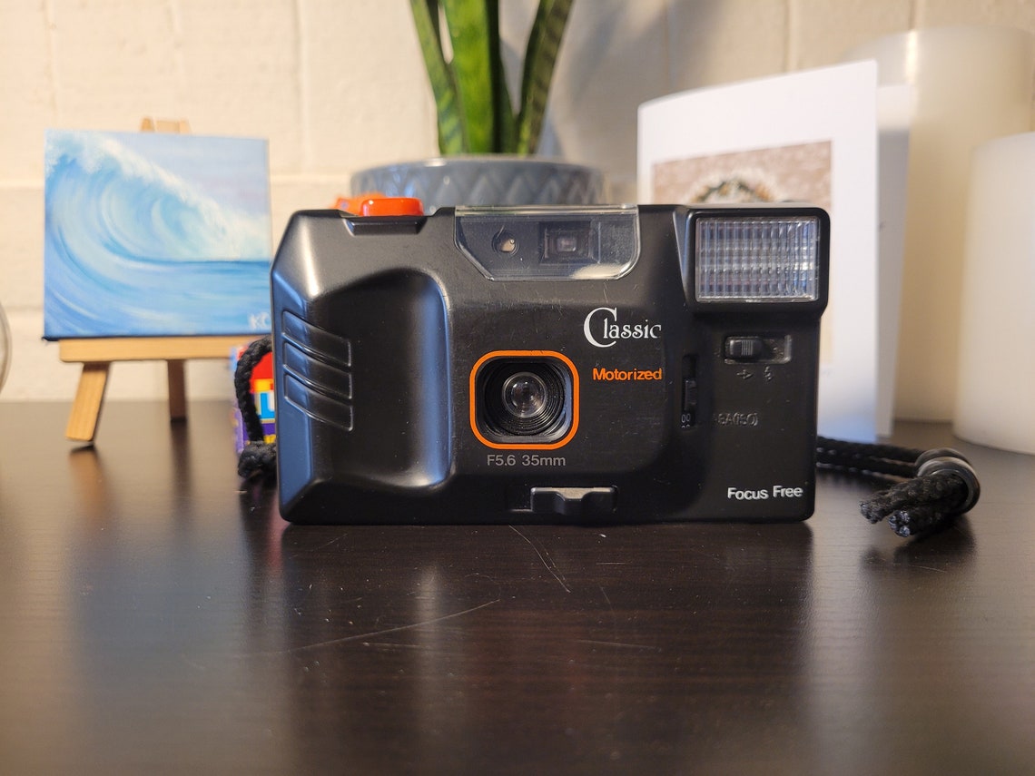 CL5000 Motorized Film Camera F5.6 35mm Focus Free With Flash, foto 1 de 5