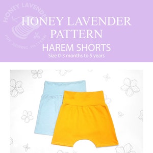 May include: Two pairs of baby harem shorts, one light blue and one yellow, on a white background with floral designs. The shorts are made of a soft, stretchy fabric and have a comfortable elastic waistband. The text "HONEY LAVENDER PATTERN HAREM SHORTS Size 0-3 months to 5 years" is printed on a purple background.