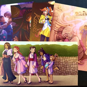 May include: A set of three ceramic vases in varying heights and shapes. The vases are glazed in a matte white finish, offering a minimalist aesthetic. The tallest vase is approximately 25 cm high.