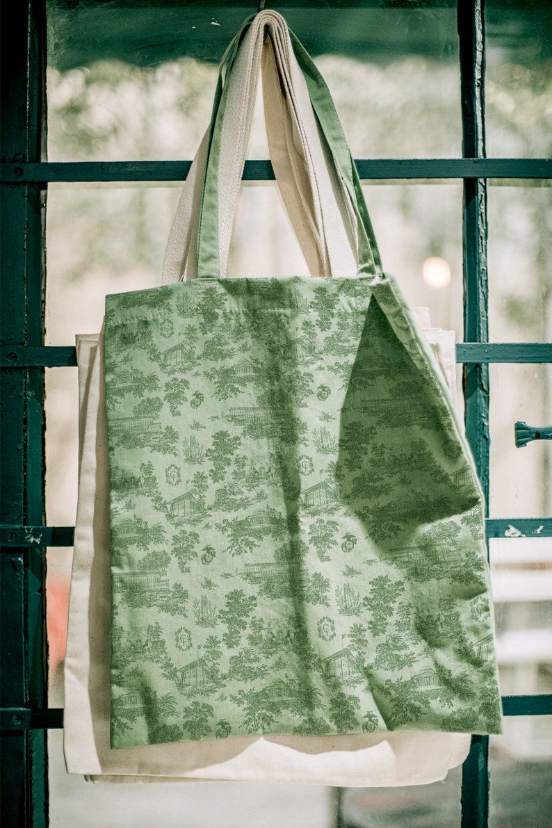 Toile pattern and wedding crest on tote bag