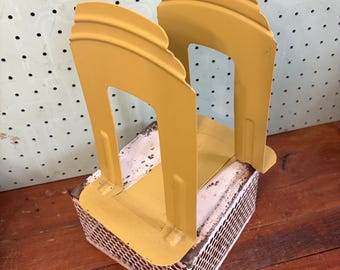 Sujetalibros vintage Art Déco o de mediados de siglo, años 60, amarillo mostaza. Se venden por pares.