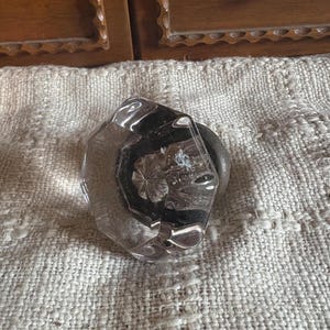 May include: A rustic wooden sign with the text "Welcome to our home" in a handwritten style. The sign features a distressed finish and a simple, inviting design, perfect for entryway decor.