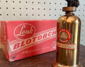 Soplete de gasolina Lenk antiguo en su caja original desde 1919.