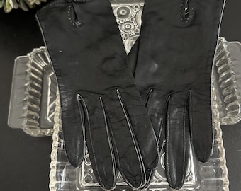 Vintage läderhandskar | Svart tvålbart läder med rosettmotiv, storlek 7