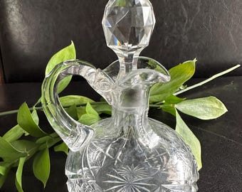 Aceitera antigua americana de cristal tallado brillante (1895-1910) con tapón facetado y diseño de estrella.