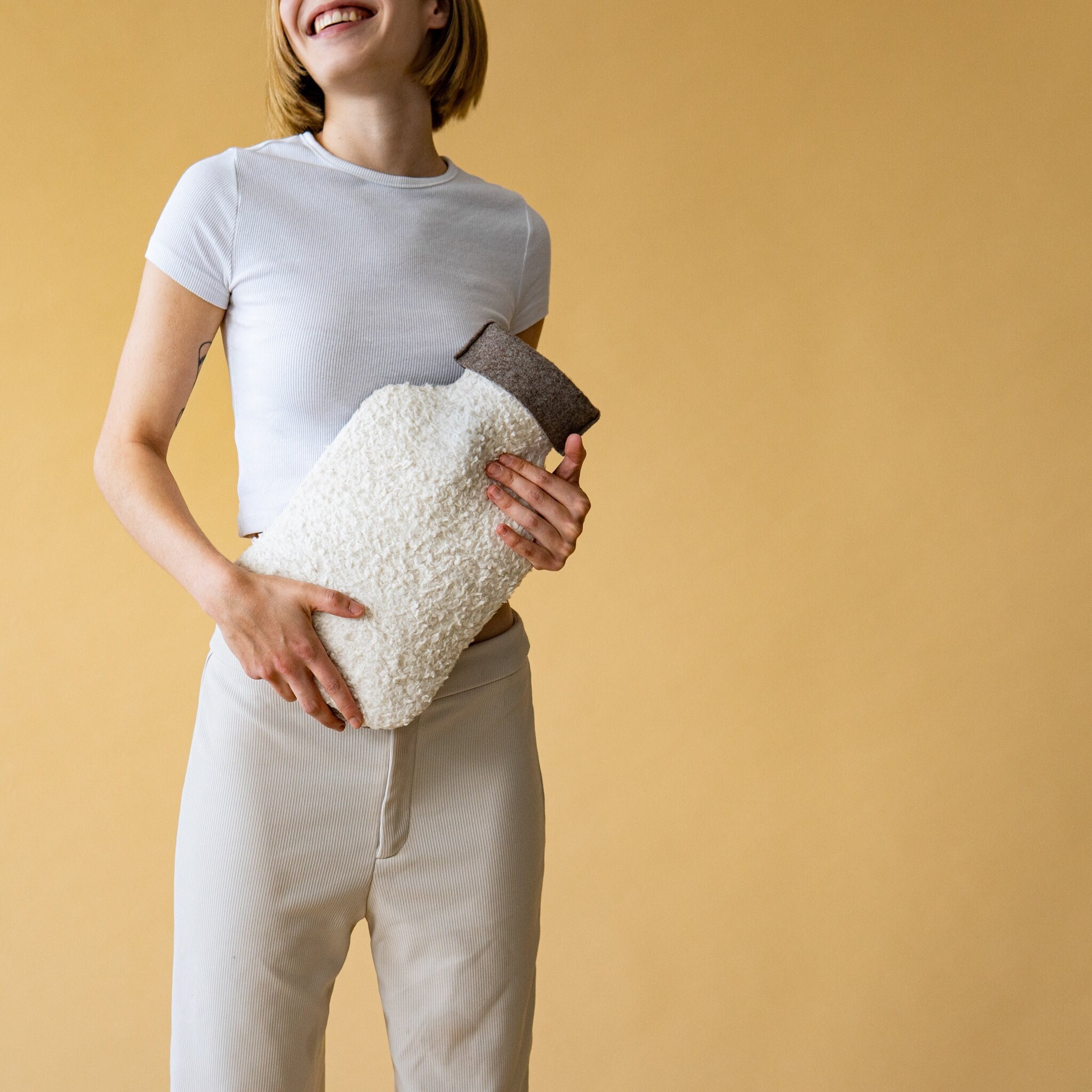 Hot water bottle cover made of soft organic cotton and felt, TÜV tested and approved.