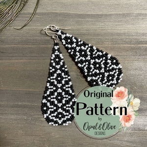 May include: A pair of black and white teardrop-shaped beaded earrings with silver hooks. The earrings are made with small beads in a geometric pattern. The image includes the text "Original Pattern by Opal & Olive Designs".