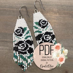 May include: Beaded earrings with a black and white rose design and fringe. The earrings have a white top section with a black and green rose pattern. The fringe is black, green, and white. The earrings are hanging on silver hooks. The image also includes a PDF download graphic.