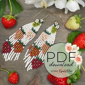 May include: Handmade beaded earrings with a strawberry design. The earrings feature white, pink, green, and red beads, with gold-colored ear wires. The earrings are displayed with fresh strawberries and flowers on a wooden surface. The text "PDF download" is visible.