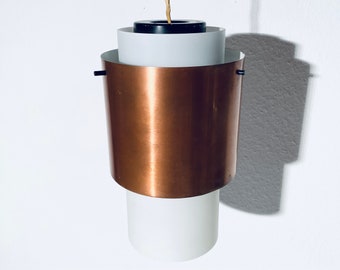 May include: A copper and white pendant light fixture with a modern design.