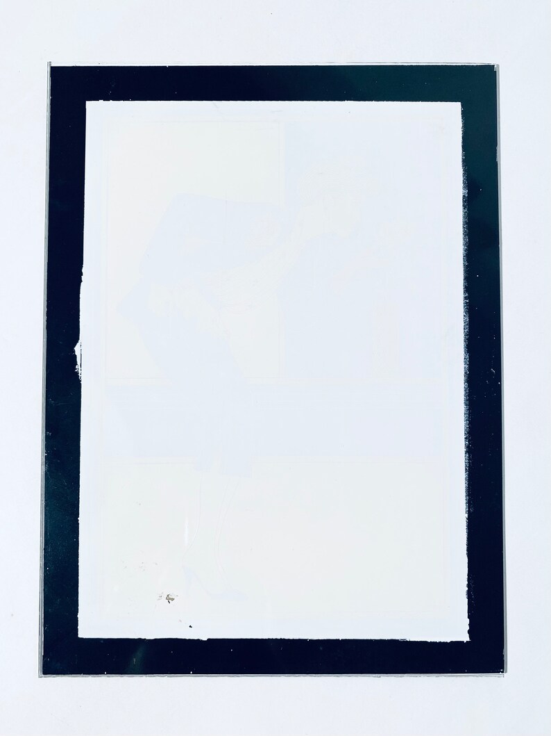 May include: A white rectangular frame with a thick black border.
