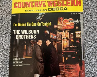 Exhibición de discos antiguos de Wilburn Brothers en tienda Decca