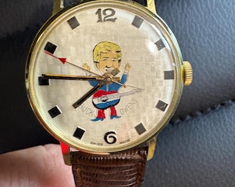 Montre guitare Buck Owens des années 60 neuve avec étui