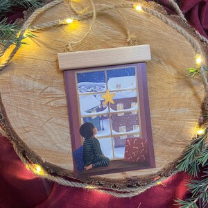 Postkarte „Schneefenster“ | Ein Blick aus dem Fenster in einer Weihnachts-/ Winternacht