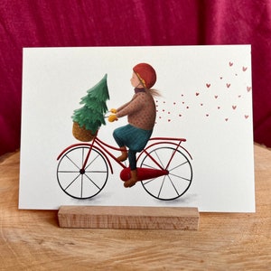 Postkarte „Dezembergefühle“ | eine besondere, liebevoll illustrierte Karte für alle, die Winter, Weihnachtsbäume und Fahrräder lieben.