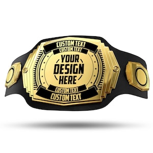 May include: A gold championship belt with a black leather strap. The belt has a large, gold-plated buckle with the text "YOUR DESIGN HERE" in black lettering. The buckle also has the text "CUSTOM TEXT" on the top and bottom.