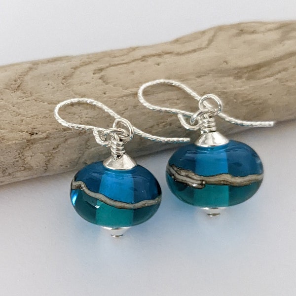 Handmade Artisan Glass Lampwork Turquoise and Teal ocean earrings. Made by myself in my little studio in Cornwall.