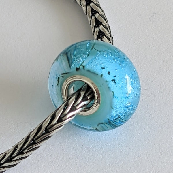 Handmade Artisan Glass Lampwork silver core Ocean bead. Please note Bracelet is not included. A lovely gift for someone special.