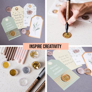 May include: A close-up of a craft project with gold wax seals, gold leaf, and metallic markers. The wax seals are on tags with the text "Enjoy Every Moment" and "Thank you from the bottom of my heart".