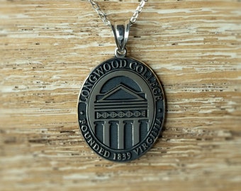 May include: Silver necklace with a round pendant featuring the Longwood College logo. The pendant is engraved with the words "Longwood College", "Founded 1839", and "Virginia".