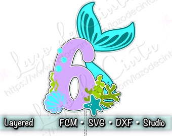 May include: Purple number six with a turquoise mermaid tail, green seaweed, and a starfish. The number six is surrounded by white seashells and blue bubbles.