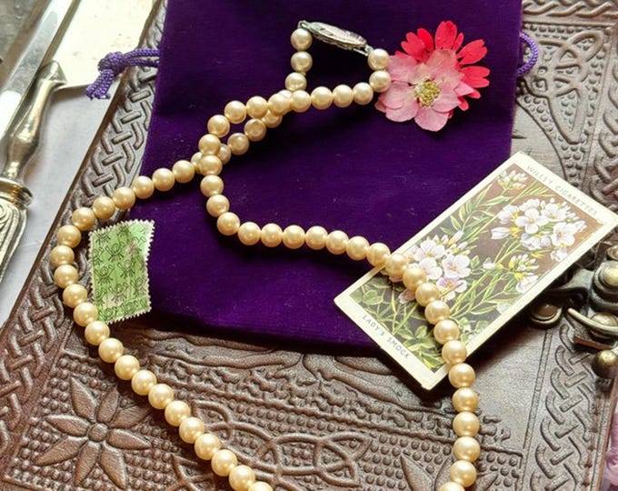 Classic vintage faux pearl necklace with secure clasp