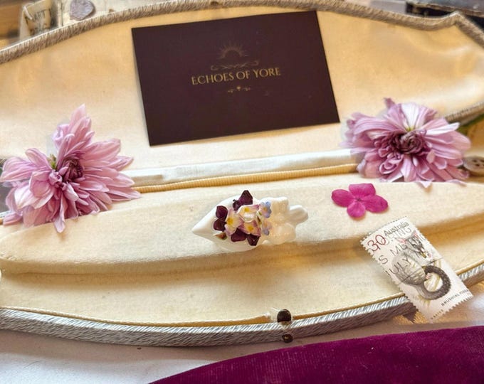 Coalport floral porcelain brooch with plum and violet blooms