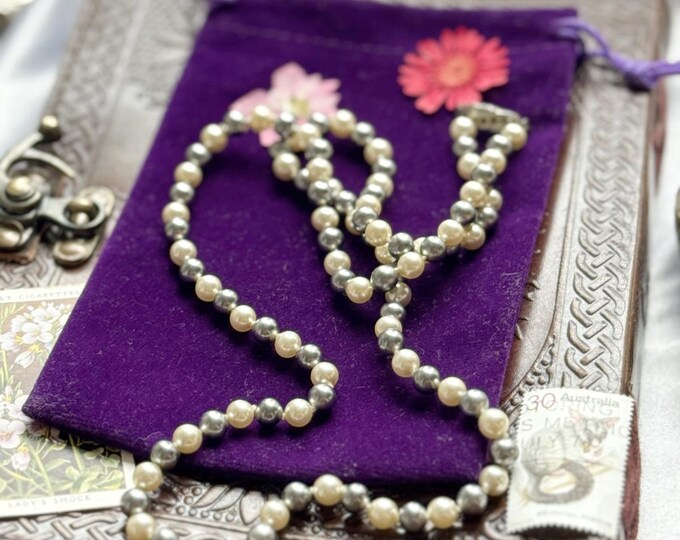 Vintage two-tone knotted glass pearl necklace with rhinestone clasp