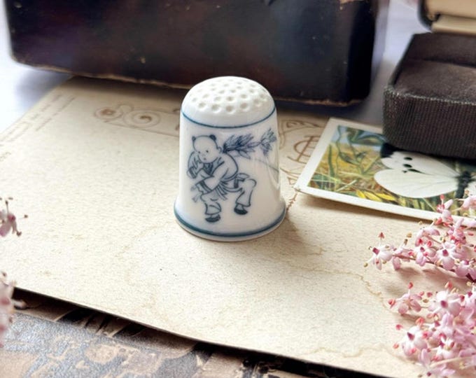 Vintage Japanese Okura Porcelain Thimble – Blue Ink “Dancing Boy” Scene