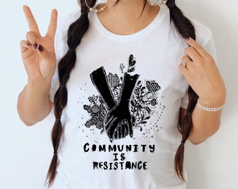 Community is resistance t-shirt. Social justice tee, tshirt, gift idea. Screen printed