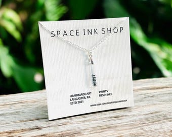 Very dainty RESIST Art resin necklace Clear Epoxy Resin Pendant, word pendant, Rectangle art Charm, linocut inspired pendant, delicate, punk
