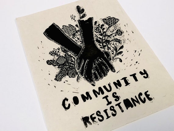 Community is Resistance Lino style illusration,,  block style print, holding hands, together, activism, feminism, social justice, BLM