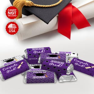 May include: Purple and white graduation party favor wrappers with the text "Class of 2025" and "Congrats Grad!" printed on them.