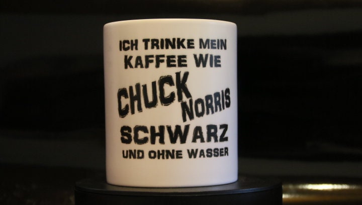 0119 Coffee mug with print Chuck Norris drinking coffee.