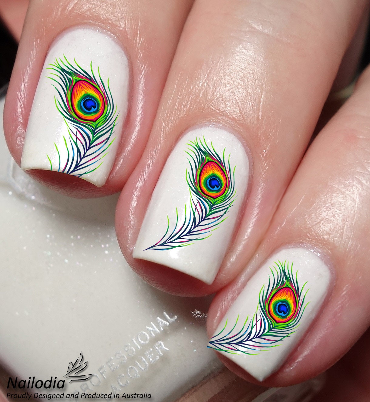 Another awesome peacock feather-themed nail art inspiration. My nails will  never be this long (they get in … | Feather nails, Peacock nail designs,  Feather nail art