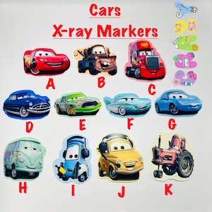 May include: A collection of car-shaped markers, featuring characters from the film "Cars." The markers are in various colours, including red, blue, and green. The text "Cars X-ray Markers" is displayed at the top of the image.