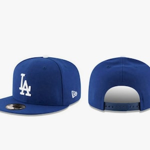 LA Dodgers ( New Era ) SnapBack Royal Blue White Lettering -“LA”, Dodgers Cap, Dodgers Snapback Cap, Los Angeles Dodgers Cap, Royal Blue Cap