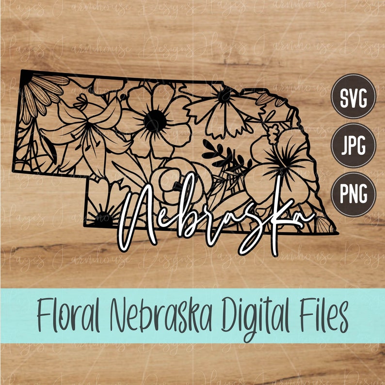 Peut inclure: Un design floral noir et blanc de l'&eacute;tat du Nebraska. Le mot "Nebraska" est &eacute;crit en cursive sous le contour de l'&eacute;tat. L'image comprend les mots "SVG", "JPG" et "PNG" dans des cercles.